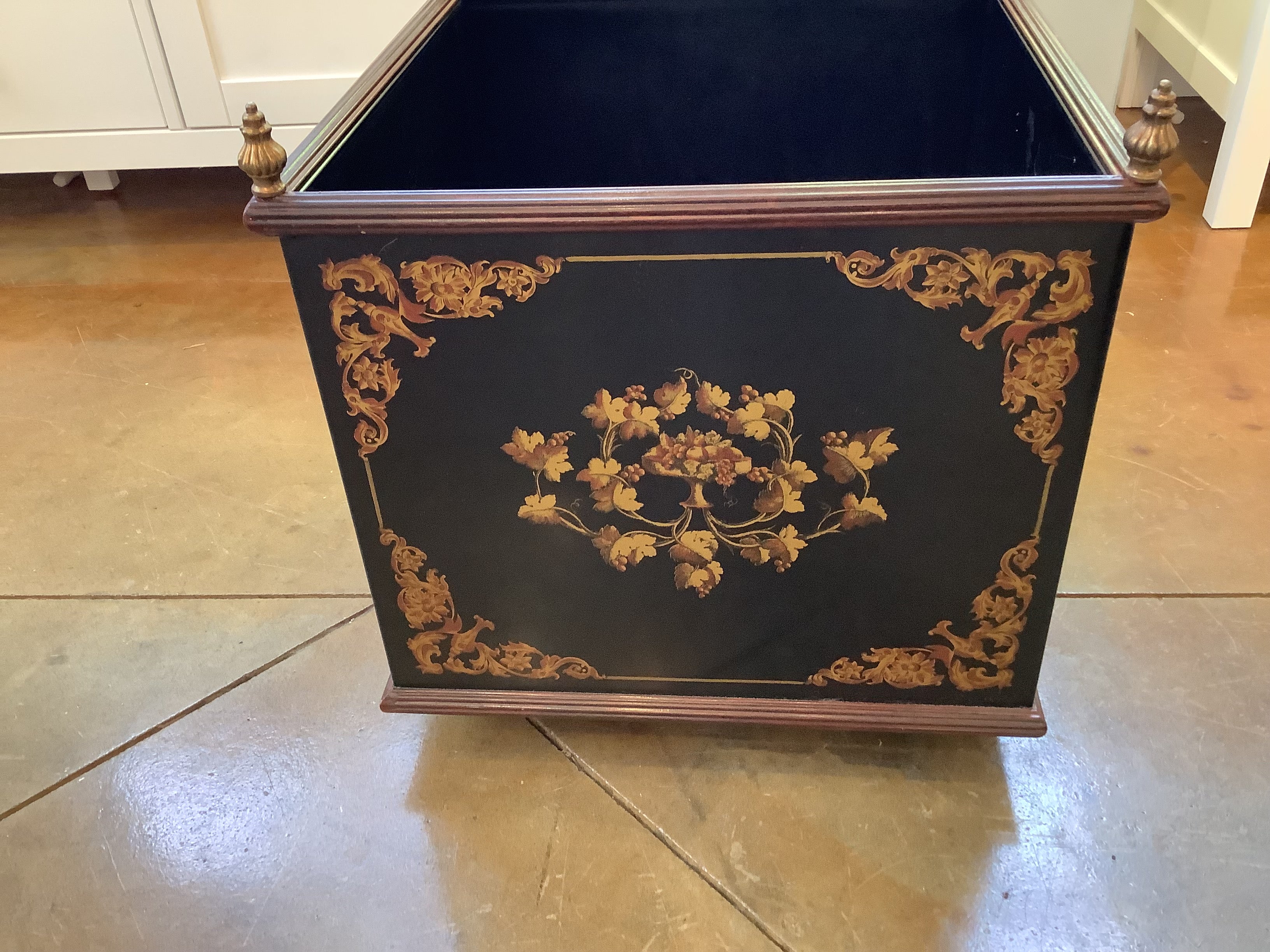 Jane Marsden black and gold tole painted metal rolling planter