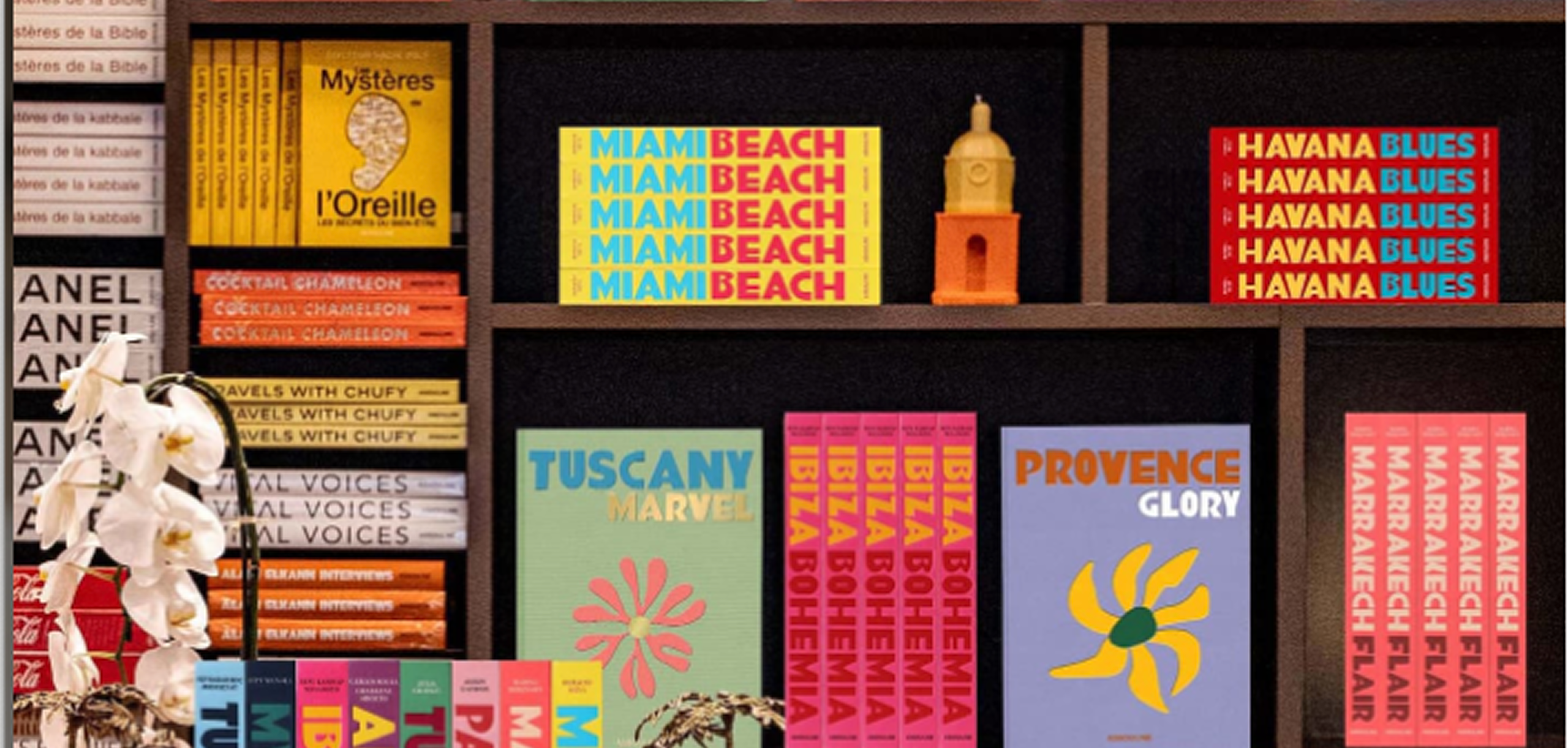 assouline books on bookshelf